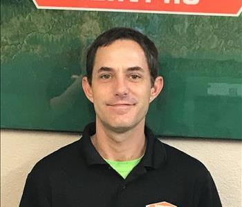Photo of Josh Eickhoff, male employee in black shirt
